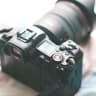 Sample stock photo of a mirrorless camera body with a lens